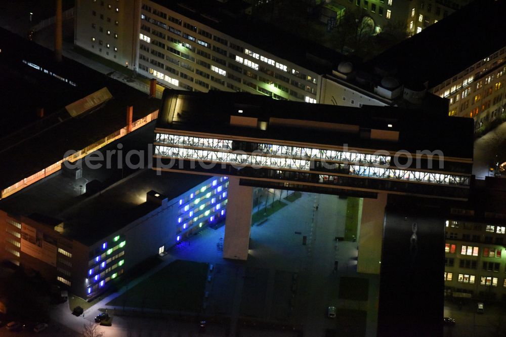 München at night from the bird perspective: Night lighting office building - Ensemble Media Works Munich at the street Rosenheimer Strasse in Munich in Bavaria