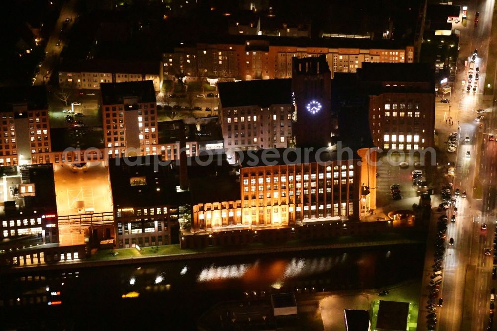 Aerial image at night Berlin - Night lighting office building - Ensemble on Ullsteinstrasse in the district Tempelhof in Berlin, Germany