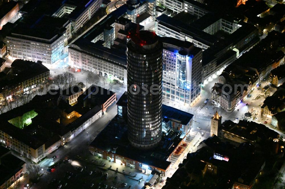 Aerial image at night Jena - Night lighting office and corporate management high-rise building Jentower on Leutragraben in Jena in the state Thuringia, Germany