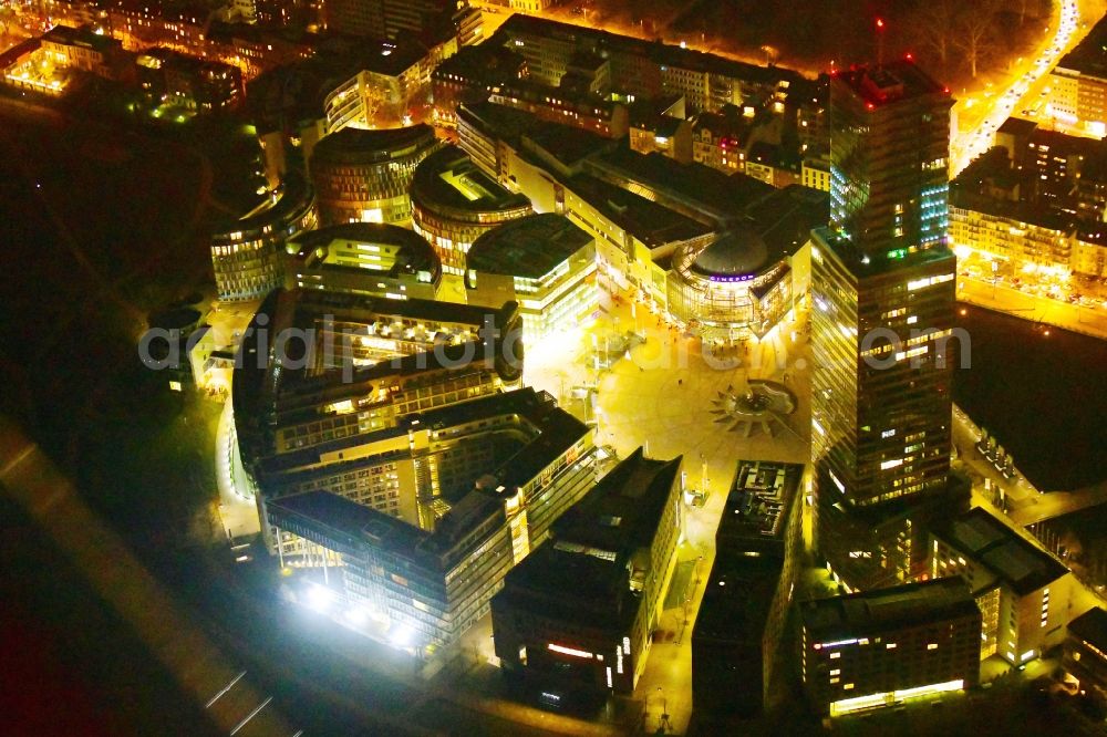 Aerial photograph at night Köln - Night lighting office and corporate management high-rise building of Koelnturms on Mediapark in the district Neustadt-Nord in Cologne in the state North Rhine-Westphalia, Germany