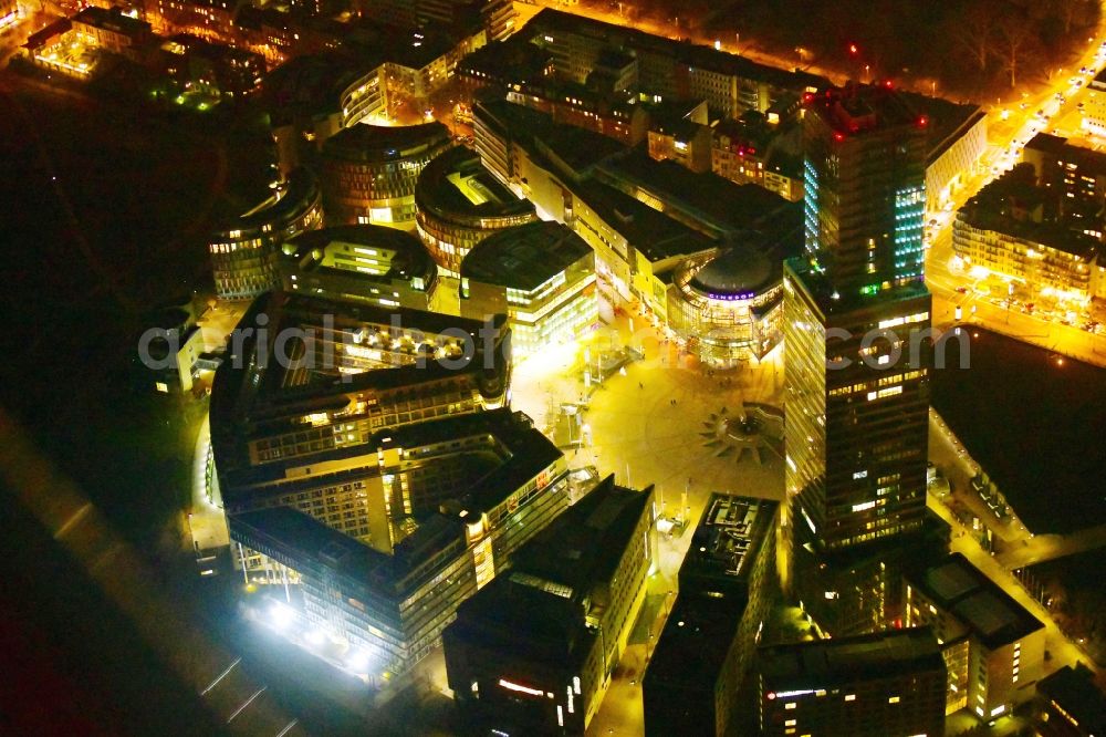 Aerial image at night Köln - Night lighting office and corporate management high-rise building of Koelnturms on Mediapark in the district Neustadt-Nord in Cologne in the state North Rhine-Westphalia, Germany