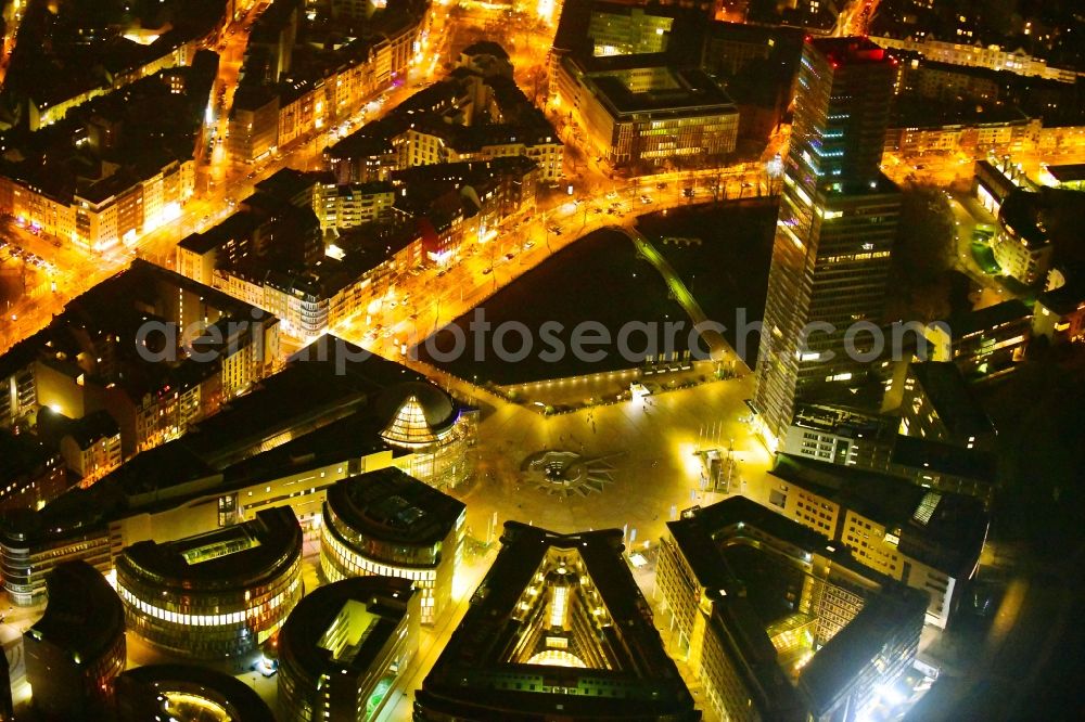 Köln at night from the bird perspective: Night lighting office and corporate management high-rise building of Koelnturms on Mediapark in the district Neustadt-Nord in Cologne in the state North Rhine-Westphalia, Germany