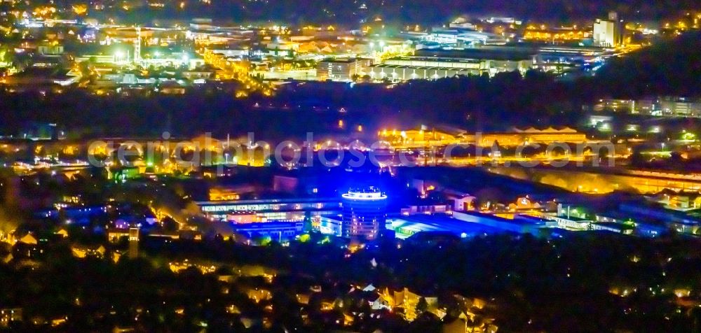 Mülheim an der Ruhr at night from above - Night lighting office and corporate management high-rise building of Siemens Bau 20 on Mellinghofer Strasse in Muelheim on the Ruhr at Ruhrgebiet in the state North Rhine-Westphalia, Germany