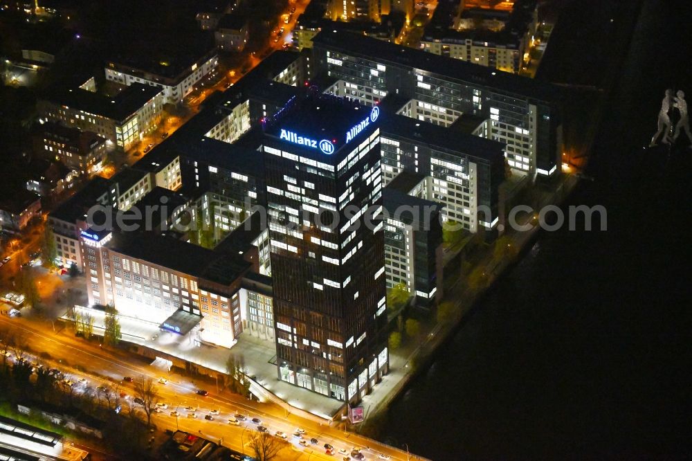 Berlin at night from above - Night lighting Office and corporate management high-rise building An den Treptowers in the district Treptow in Berlin, Germany