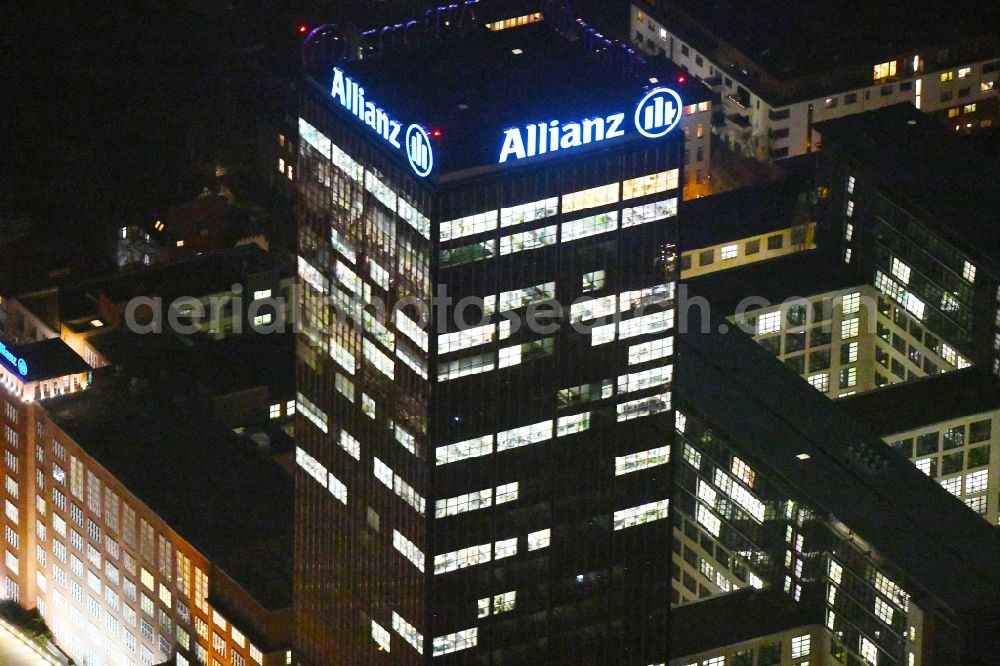 Berlin at night from above - Night lighting Office and corporate management high-rise building An den Treptowers in the district Treptow in Berlin, Germany