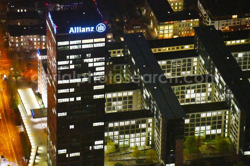 Aerial photograph at night Berlin - Night lighting Office and corporate management high-rise building An den Treptowers in the district Treptow in Berlin, Germany