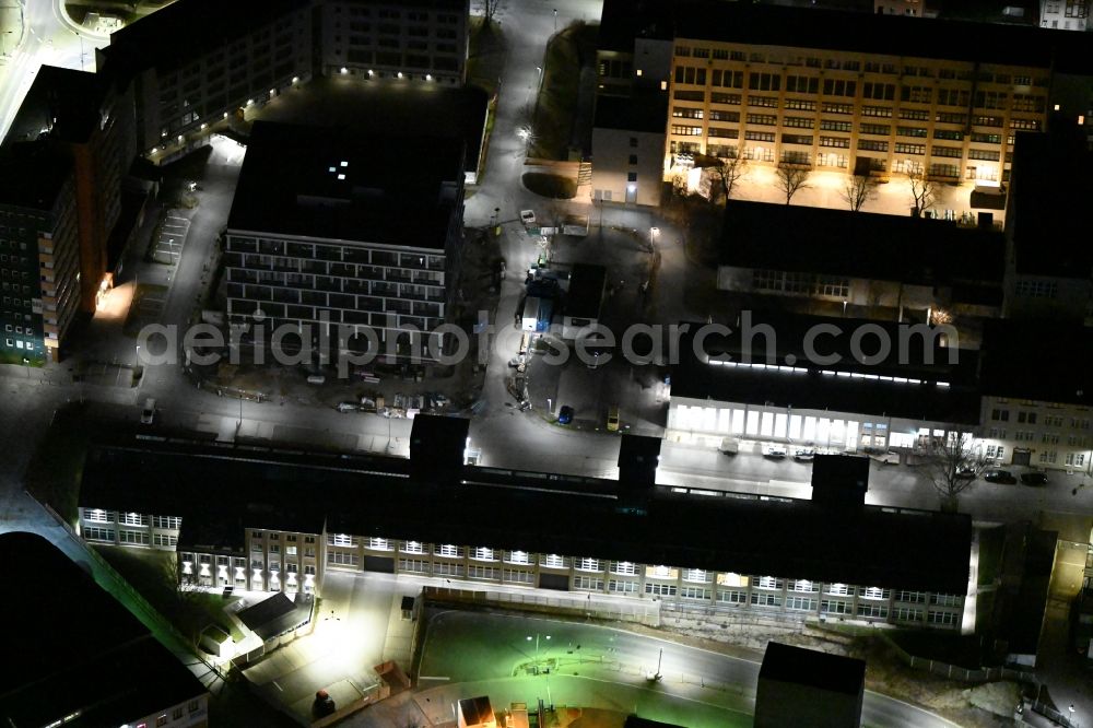 Aerial photograph at night Jena - Night lighting office building on Carl-Pulfrich-Strasse in the district Lichtenhain in Jena in the state Thuringia, Germany