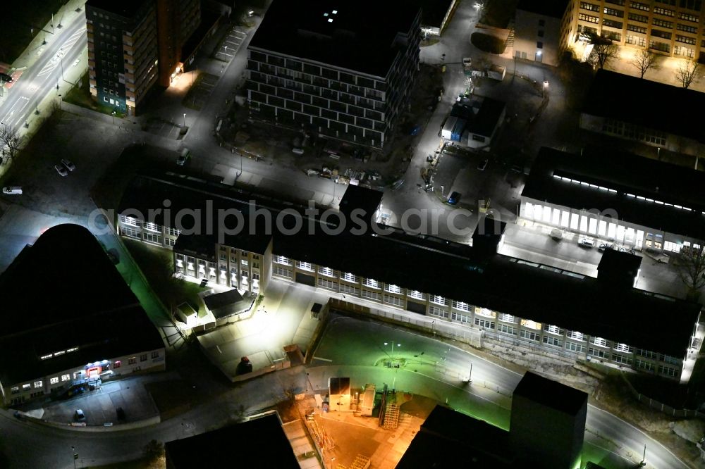 Aerial image at night Jena - Night lighting office building on Carl-Pulfrich-Strasse in the district Lichtenhain in Jena in the state Thuringia, Germany