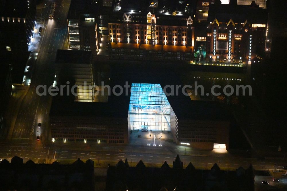 Aerial image at night Hamburg - Night lighting office building of DNV GL SE on Brooktorkai in Hamburg, Germany