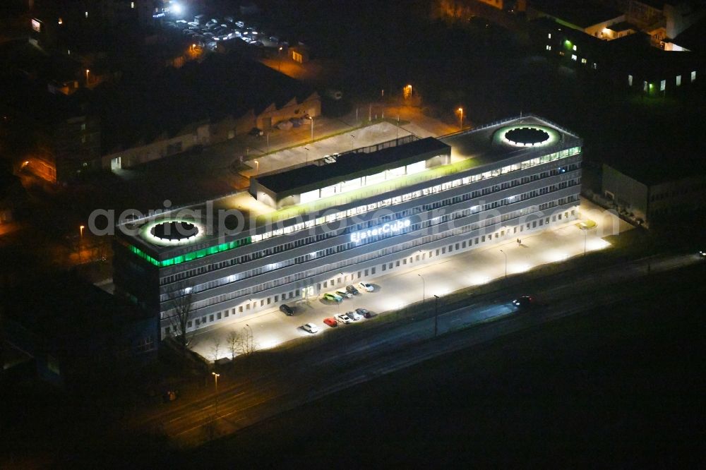 Aerial image at night Gera - Night lighting Office building ElsterCube on Vogtlandstrasse in Gera in the state Thuringia, Germany