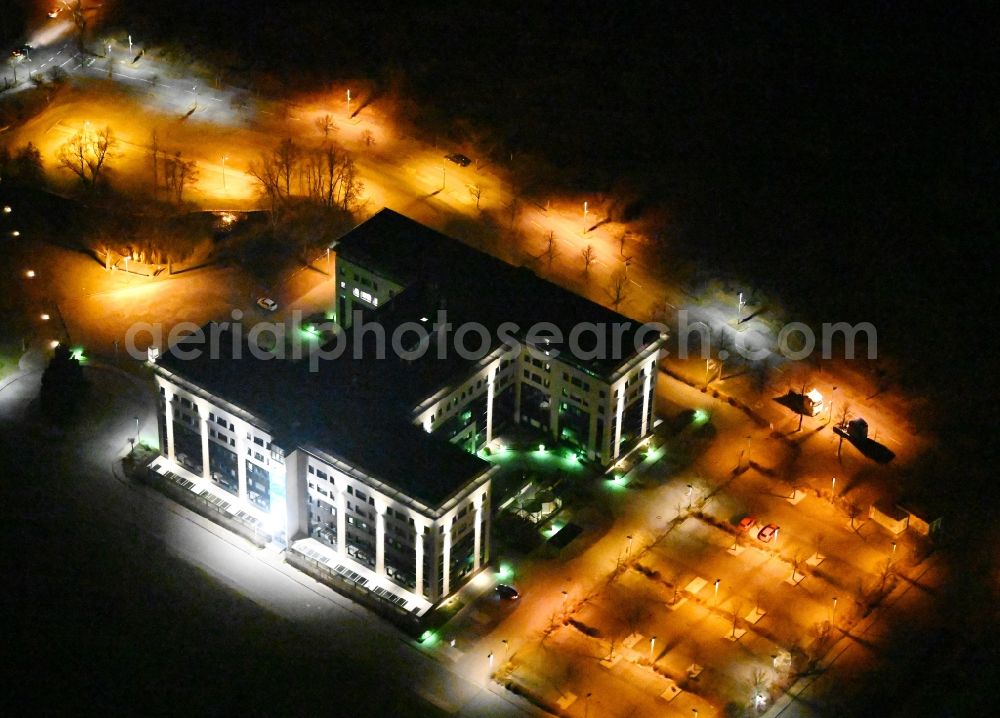 Aerial photograph at night Kabelsketal - Night lighting office building Europa Center in the district Grosskugel in Kabelsketal in the state Saxony-Anhalt, Germany