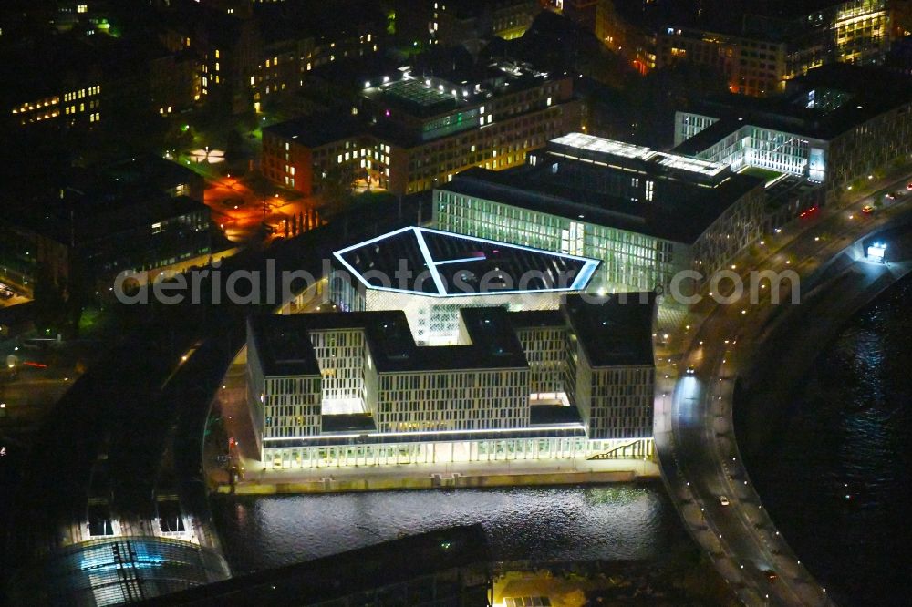 Aerial image at night Berlin - Night lighting Office building HumboldtHafenEins on Alexanderufer in the district Mitte in Berlin, Germany