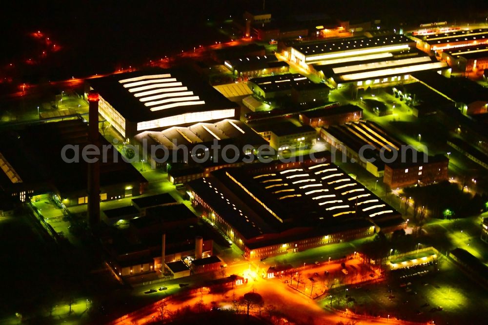 Hennigsdorf at night from above - Night lighting office building Manpower GmbH & Co. KG Am Rathenaupark in Hennigsdorf in the state Brandenburg, Germany