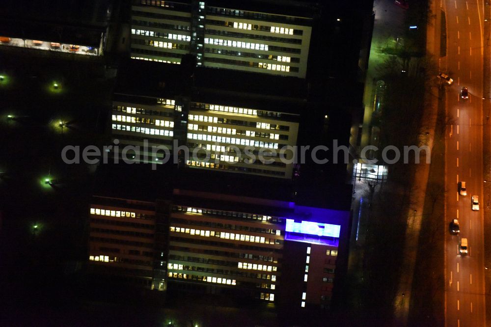 Aerial image at night München - Night lighting office building OLYMPIA BUSINESS CENTER on street Georg-Brauchle-Ring in the district Moosach in Munich in the state Bavaria, Germany