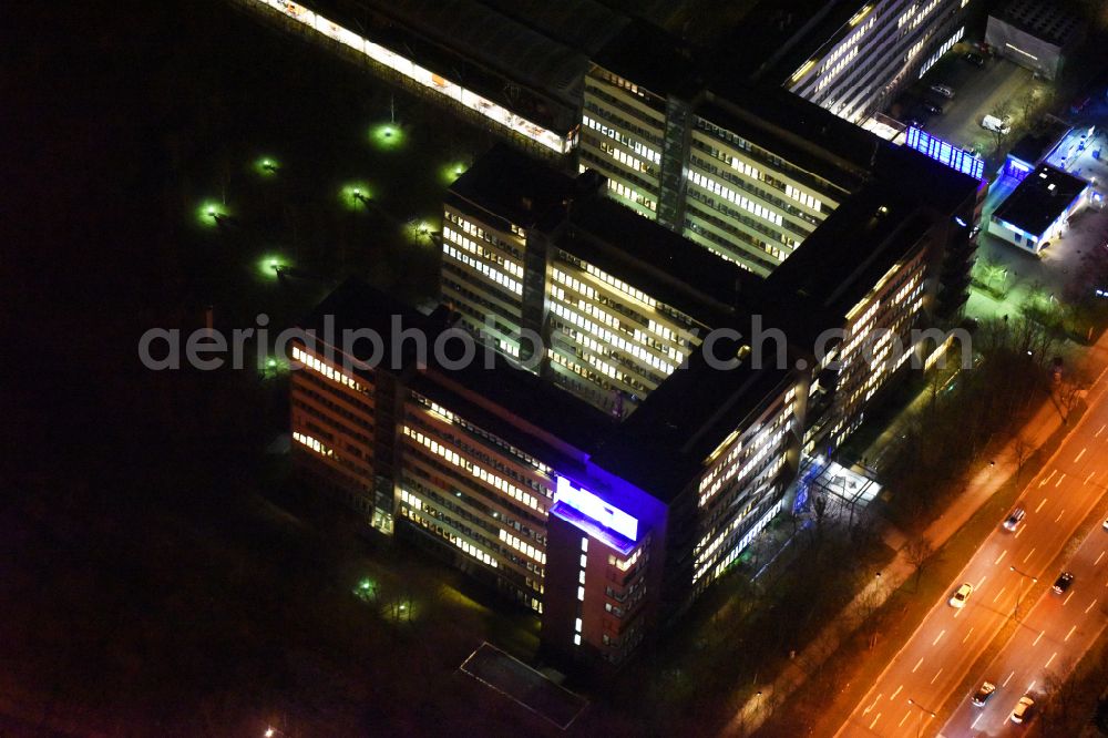 München at night from above - Night lighting office building OLYMPIA BUSINESS CENTER on street Georg-Brauchle-Ring in the district Moosach in Munich in the state Bavaria, Germany