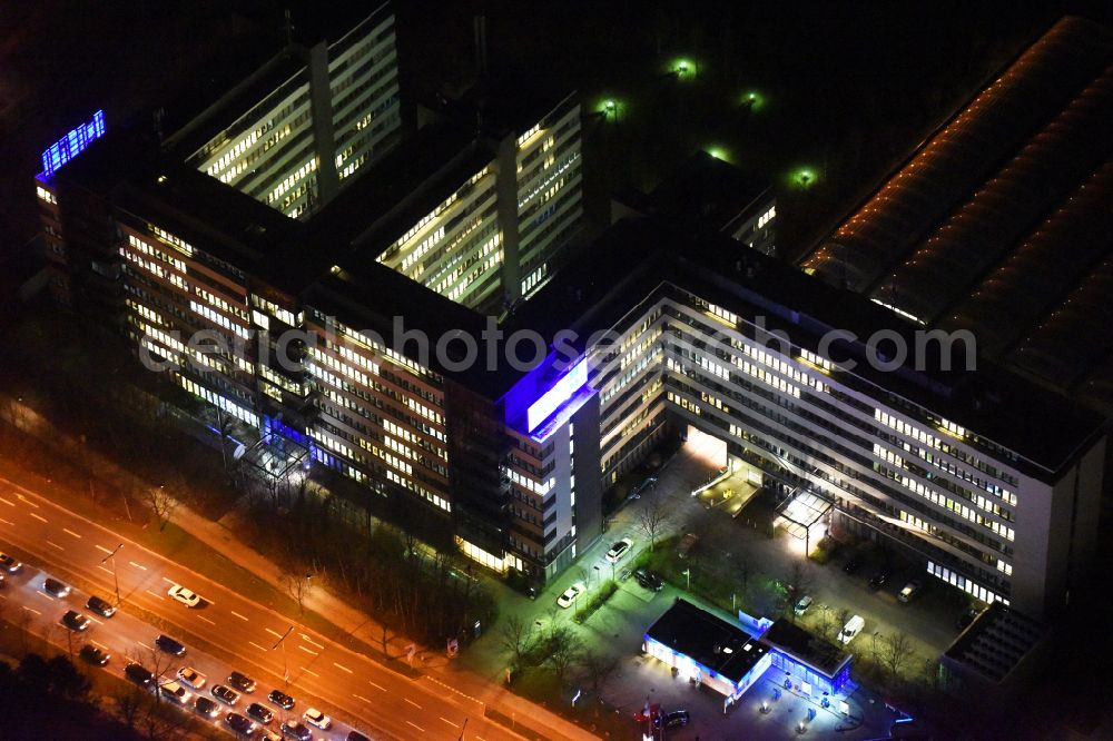 München at night from the bird perspective: Night lighting office building OLYMPIA BUSINESS CENTER on street Georg-Brauchle-Ring in the district Moosach in Munich in the state Bavaria, Germany