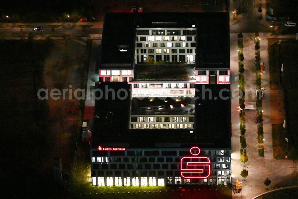 Berlin at night from above - Night lighting office building Square 1 on street Wagner-Regeny-Allee - Benno-Koenig-Strasse in the district Johannisthal in Berlin, Germany