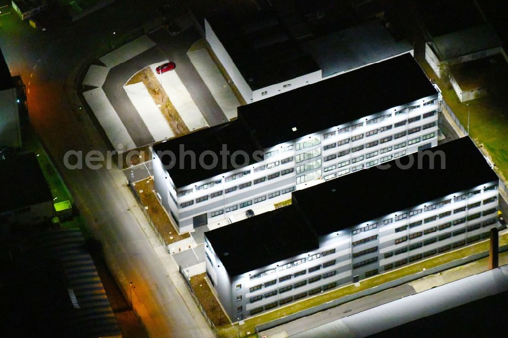 Aerial photograph at night Wolfsburg - Night lighting Office building of VOLKE Entwicklungsring AG in Wolfsburg in the state Lower Saxony, Germany