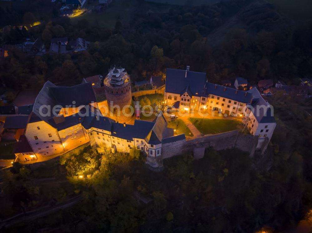 Aerial photograph at night Leisnig - Night lighting mildenstein Castle in Leisnig in the state of Saxony