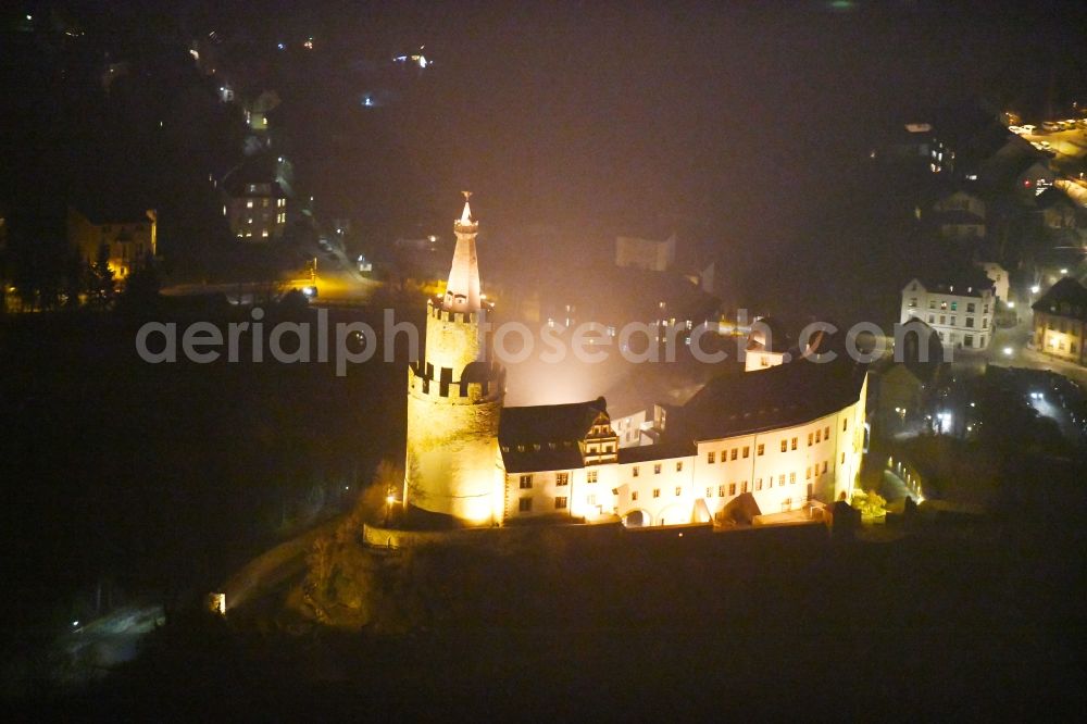 Aerial image at night Weida - Night lighting Castle of the fortress - Museum Osterburg on Schlossberg in Weida in the state Thuringia, Germany