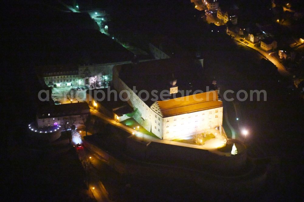 Aerial image at night Kulmbach - Night lighting Castle of the fortress Plassenburg on Festungsberg in Kulmbach in the state Bavaria, Germany