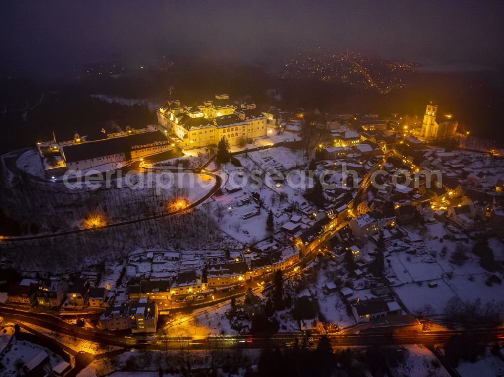 Augustusburg at night from the bird perspective: Night lighting castle of Schloss and theater in Augustusburg in the state Saxony