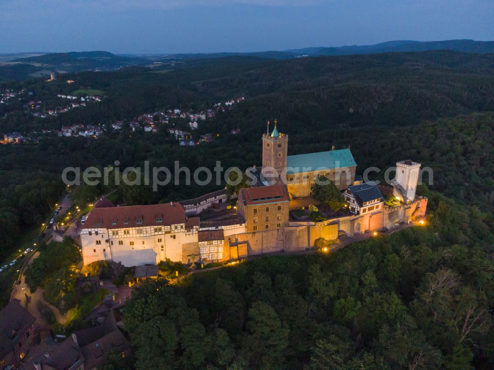 Eisenach at night from above - Night lights and lighting at the Wartburg Fortress in Eisenach in the state of Thuringia, Germany