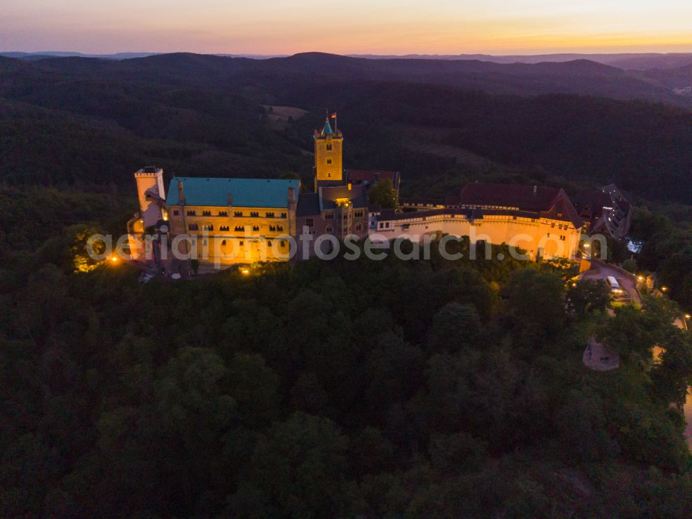 Eisenach at night from above - Night lights and lighting at the Wartburg Fortress in Eisenach in the state of Thuringia, Germany