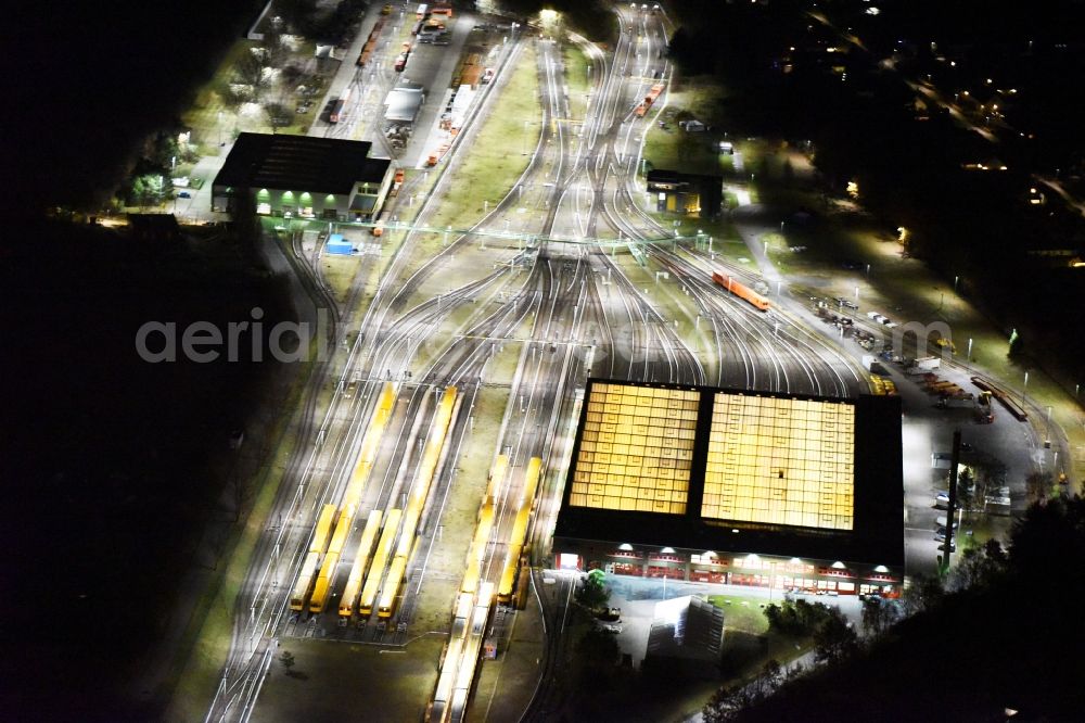 Aerial photograph at night Berlin - Night view company BVG underground service station at the Schlossweg in Berlin-Britz