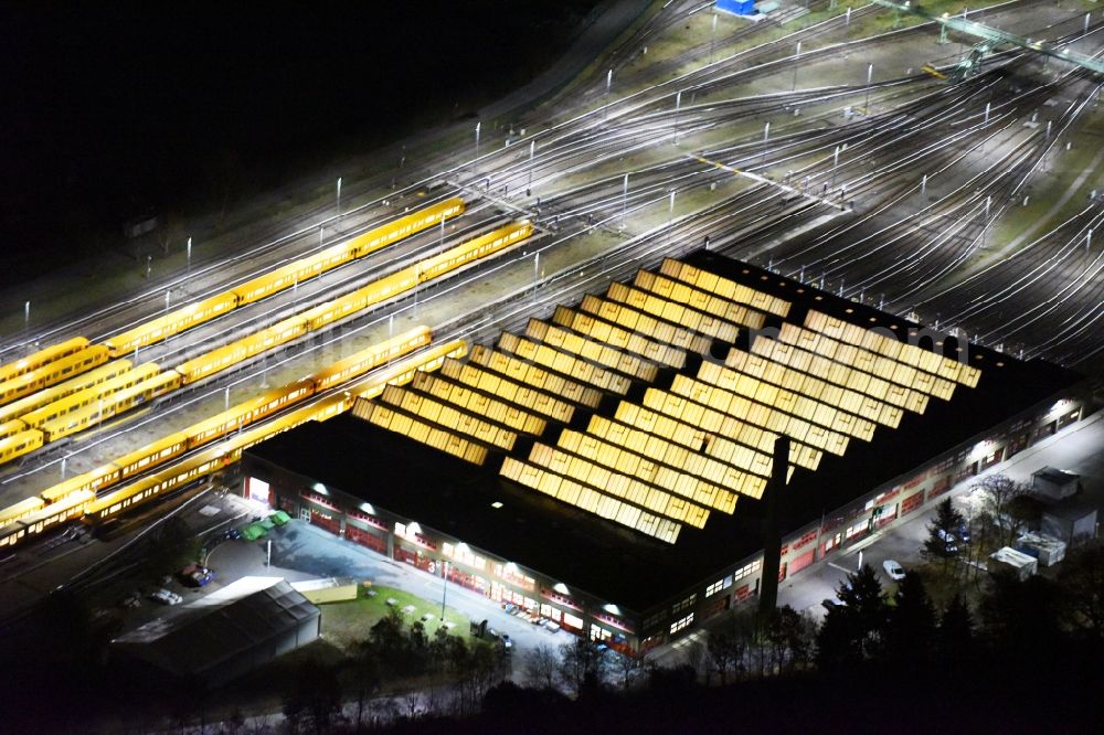 Berlin at night from the bird perspective: Night view company BVG underground service station at the Schlossweg in Berlin-Britz