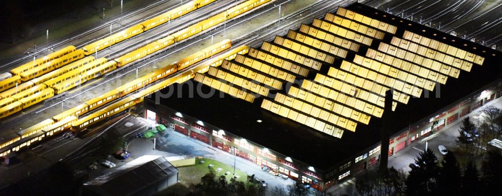 Aerial photograph at night Berlin - Night view company BVG underground service station at the Schlossweg in Berlin-Britz