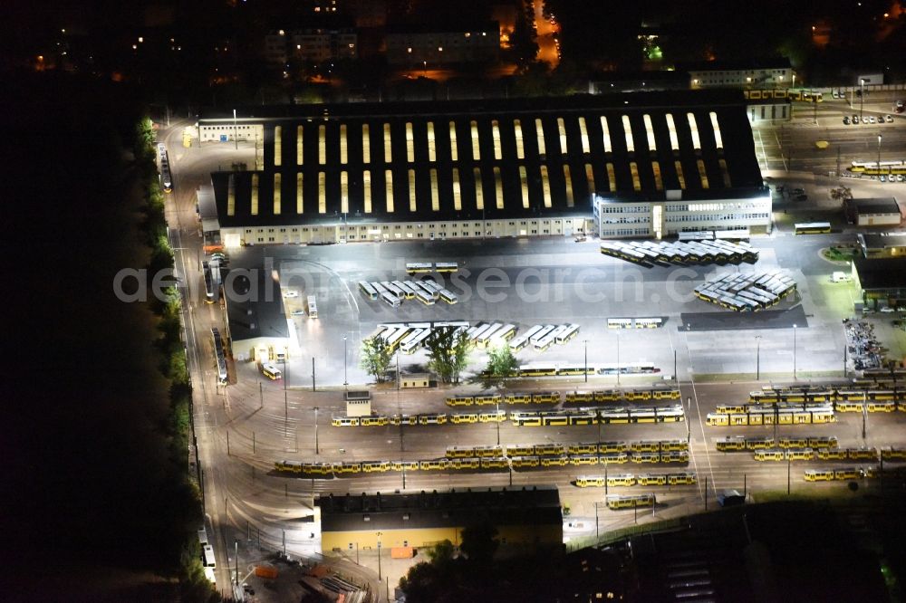 Berlin at night from above - Night image with a view over the BVG bus and train station in the district Lichtenberg in Berlin