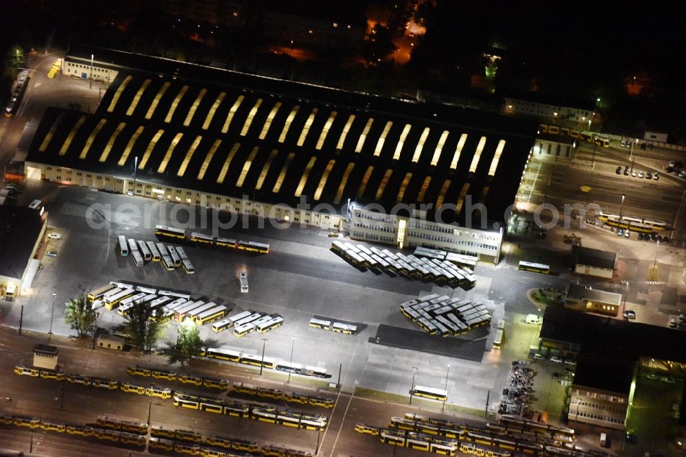 Berlin at night from the bird perspective: Night image with a view over the BVG bus and train station in the district Lichtenberg in Berlin