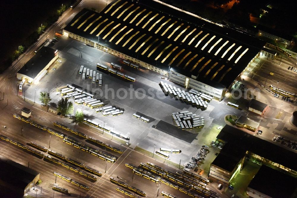 Berlin at night from above - Night image with a view over the BVG bus and train station in the district Lichtenberg in Berlin