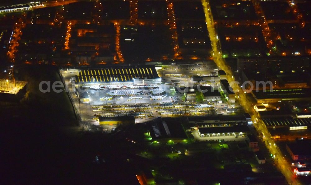 Berlin at night from the bird perspective: Night image with a view over the BVG bus and train station in the district Lichtenberg in Berlin