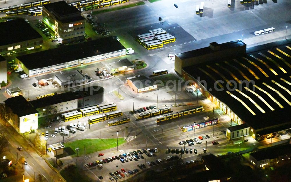 Berlin at night from the bird perspective: Night image with a view over the BVG bus and train station in the district Lichtenberg in Berlin