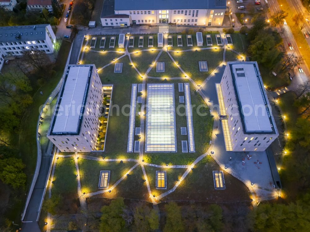 Dresden at night from above - Night lights and lighting campus building of the university TU Technical University Saxon State Library - State and University Library Dresden - SLUB with reading room and depot building on the street Zellescher Weg in the district of Raecknitz in Dresden in the federal state of Saxony, Germany