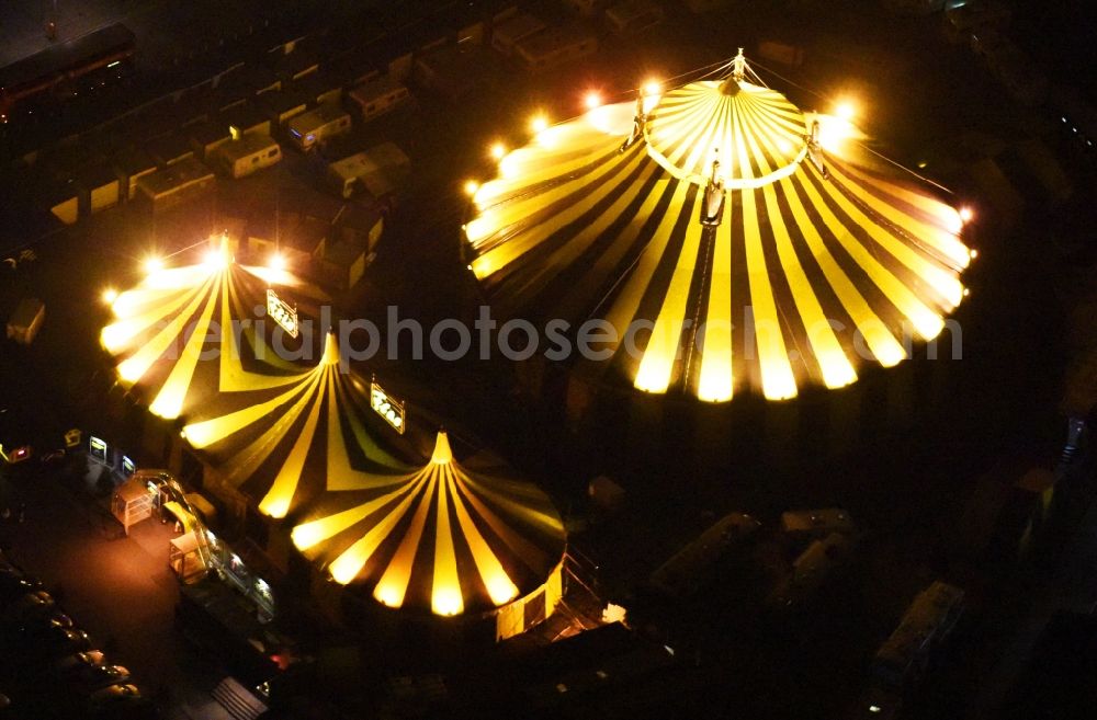 Berlin at night from the bird perspective: Night view of circus tent domes of the circus of the Flic Flac Tour GmbH in the Charlottenburg district in Berlin