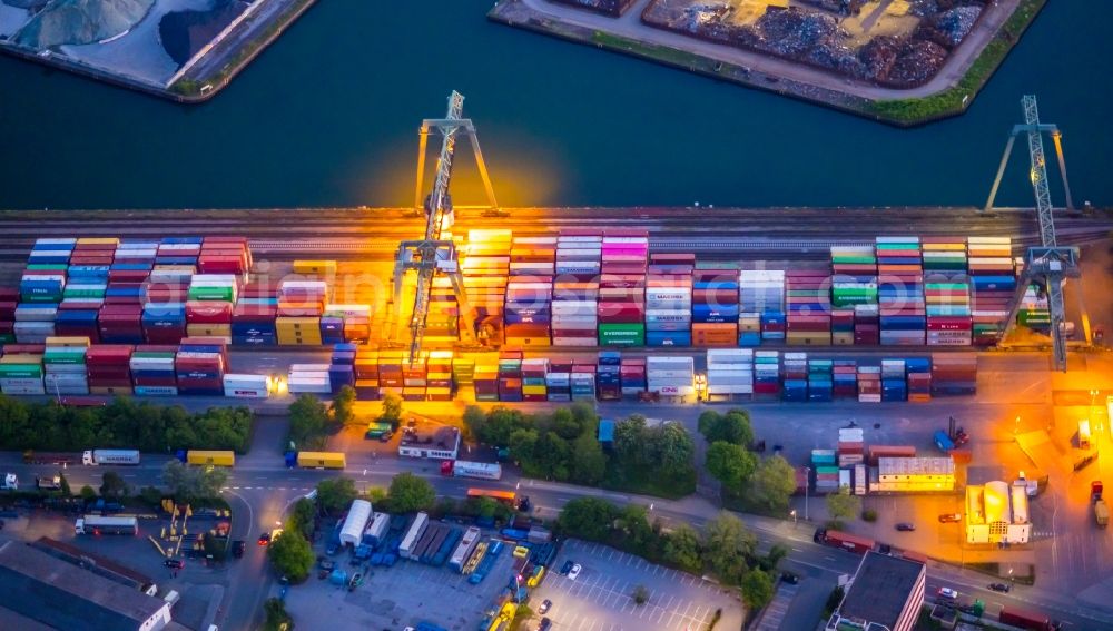 Dortmund at night from the bird perspective: Night lighting container Terminal in the port of the inland port of Container Terminal Dortmund GmbH in Dortmund at Ruhrgebiet in the state North Rhine-Westphalia, Germany