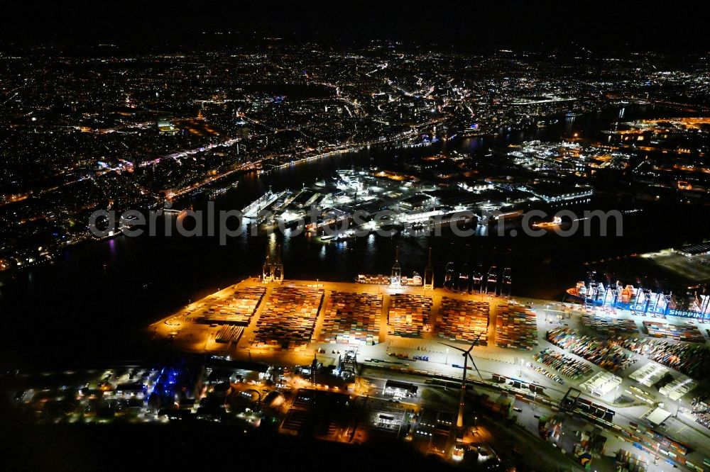 Hamburg at night from the bird perspective: Night lighting container Terminal Tollerort in the port of the international port in district Steinwerder in the district Steinwerder in Hamburg with sewage works Koehlbrandhoeft