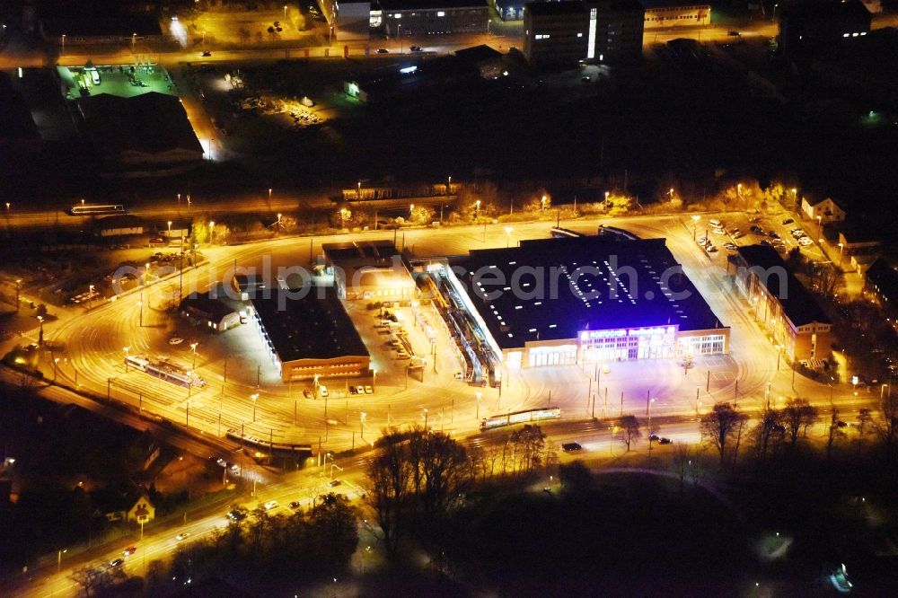 Rostock at night from the bird perspective: Night view estates depot / depot tramway in Rostock in Mecklenburg-Western Pomerania