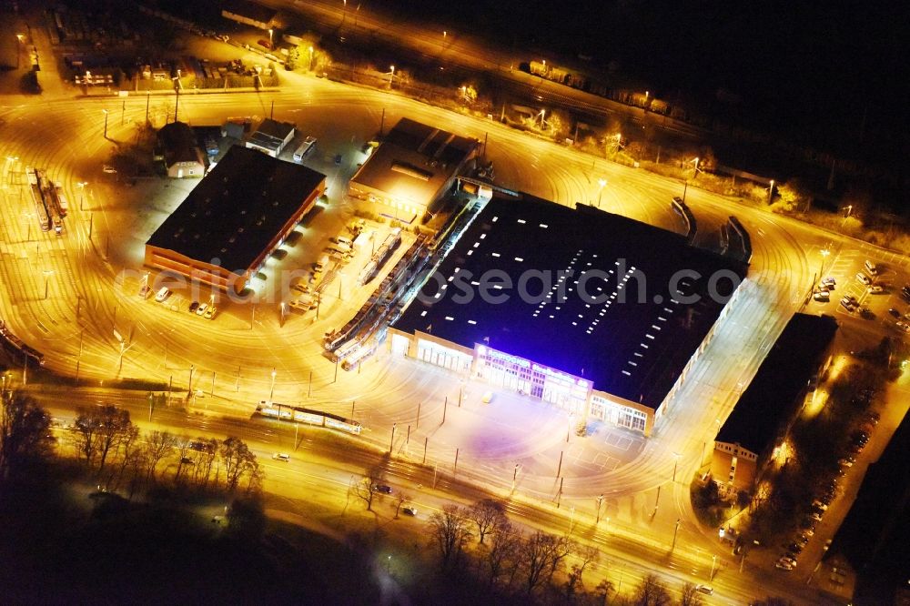 Rostock at night from the bird perspective: Night view estates depot / depot tramway in Rostock in Mecklenburg-Western Pomerania