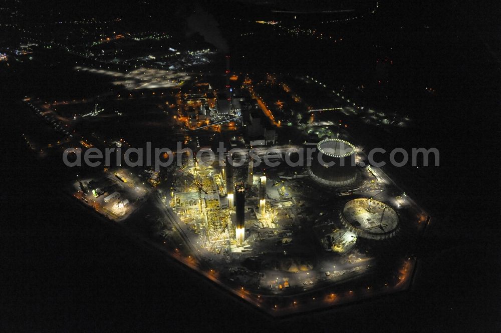 Hamm at night from the bird perspective: Night view of Construction site at the powerhouse / coal power station in the district Hamm-Uentrop with the former nuclear power station NPS / atomic plant THTR-300 in North Rhine-Westphalia