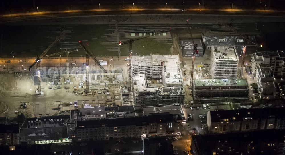 Düsseldorf at night from the bird perspective: Night aerial view of the site of the new quarter, Le flair in new luxury residential district in central Dusseldorf in North Rhine-Westphalia