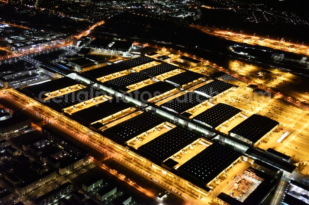 Aerial image at night München - Night view of the Fairgrounds Munich in the state Bavaria