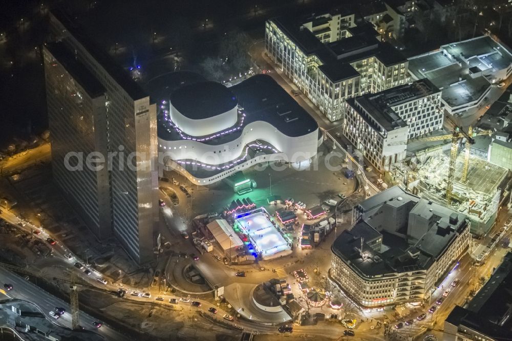 Düsseldorf at night from above - Night aerial view of the illuminated city Duesseldorf on skyscraper Dreischeibenhaus and the Schauspielhouse in the state capital of North Rhine-Westphalia