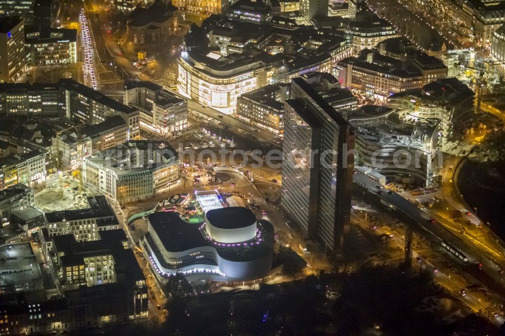 Düsseldorf at night from above - Night aerial view of the illuminated city Duesseldorf on skyscraper Dreischeibenhaus and the Schauspielhouse in the state capital of North Rhine-Westphalia