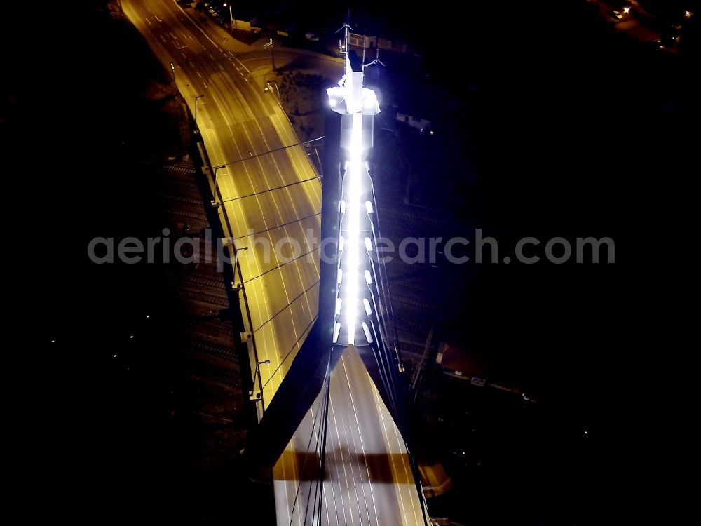 Halle (Saale) at night from the bird perspective: Night aerial view of Berlin Bridge in Halle (Saale) in Saxony-Anhalt