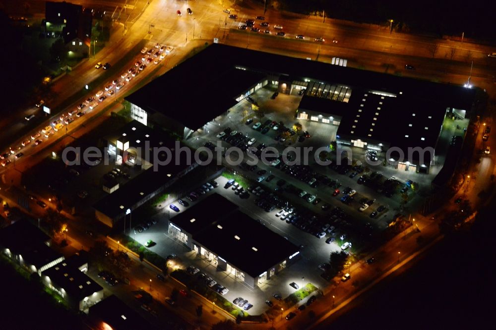 Berlin Biesdorf at night from above - Night aerial photo of a BMW branch Marzahn in the district Biesdorf in Berlin