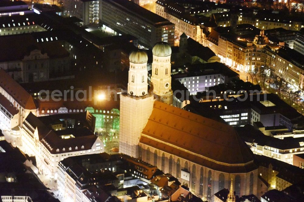 Aerial image at night München - City view of the Old Town at the Frauenkirche at the New Town Hall in the center of Munich in Bavaria